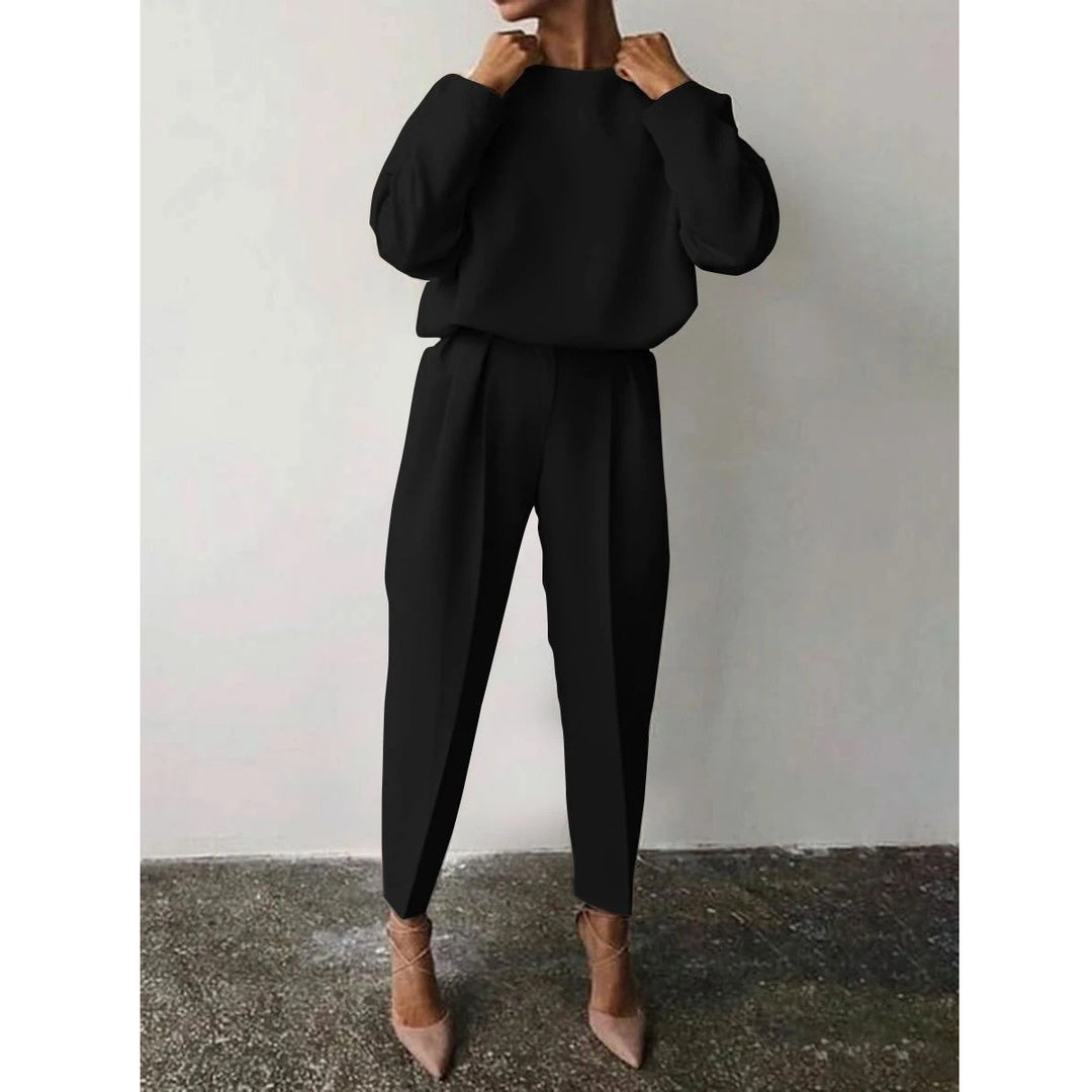 Trendy women's jumpsuit with loose fit and elegant puffed sleeves Lune London