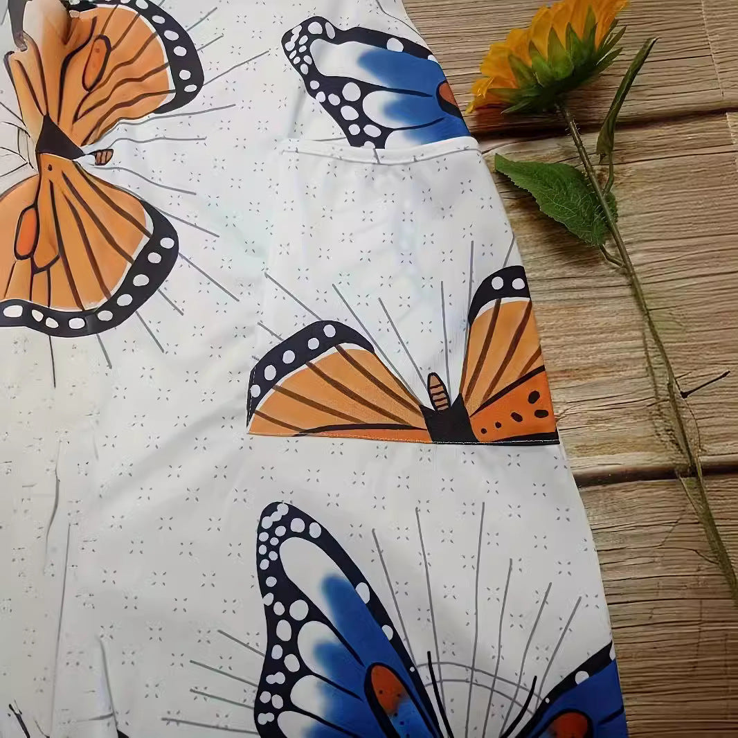Lady jumpsuit with colorful butterfly pattern and practical pockets Lune London