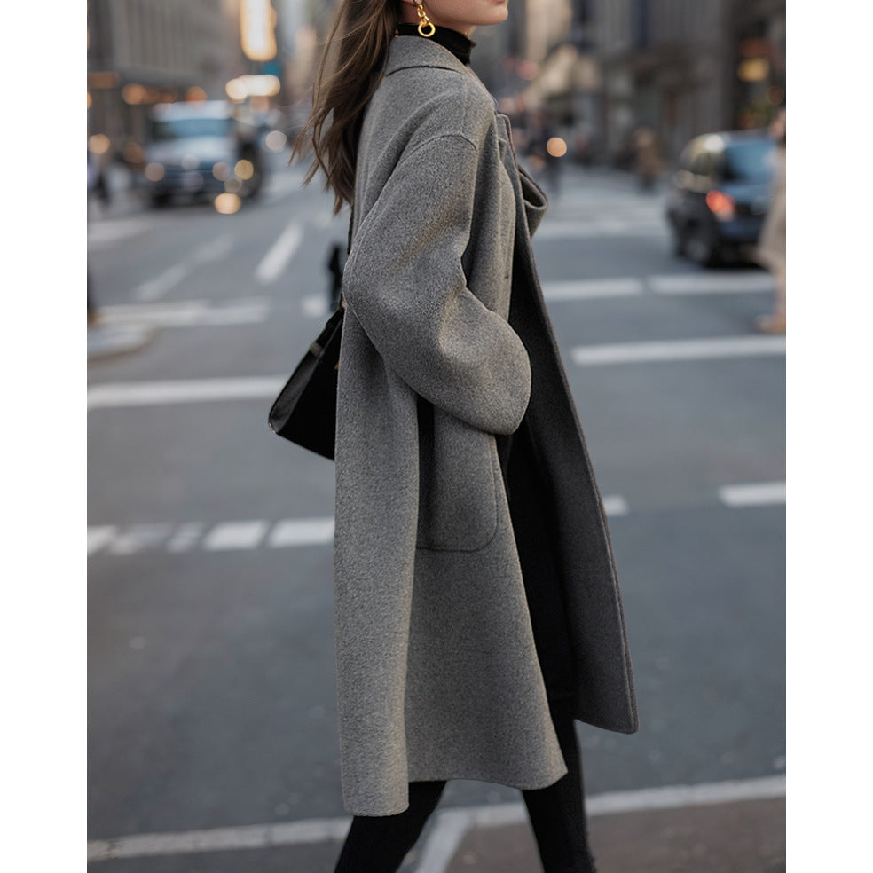 Elegant wool coat for women with high pockets and classic lapels Amarae