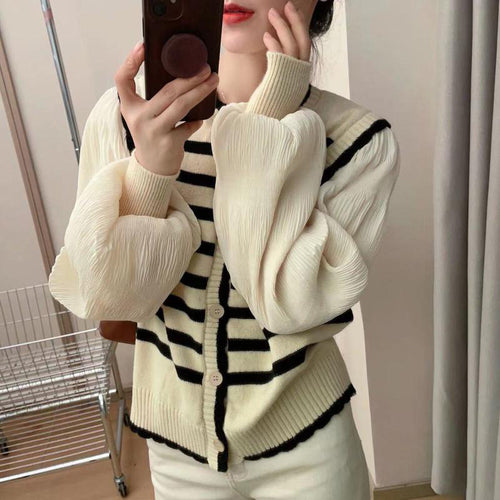 Cardigan femme avec des manches volumineuses et un motif rayé Chic & Stil