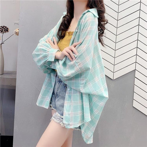 Chemise blouse décontractée à carreaux pour femmes avec coupe ample Chic & Stil