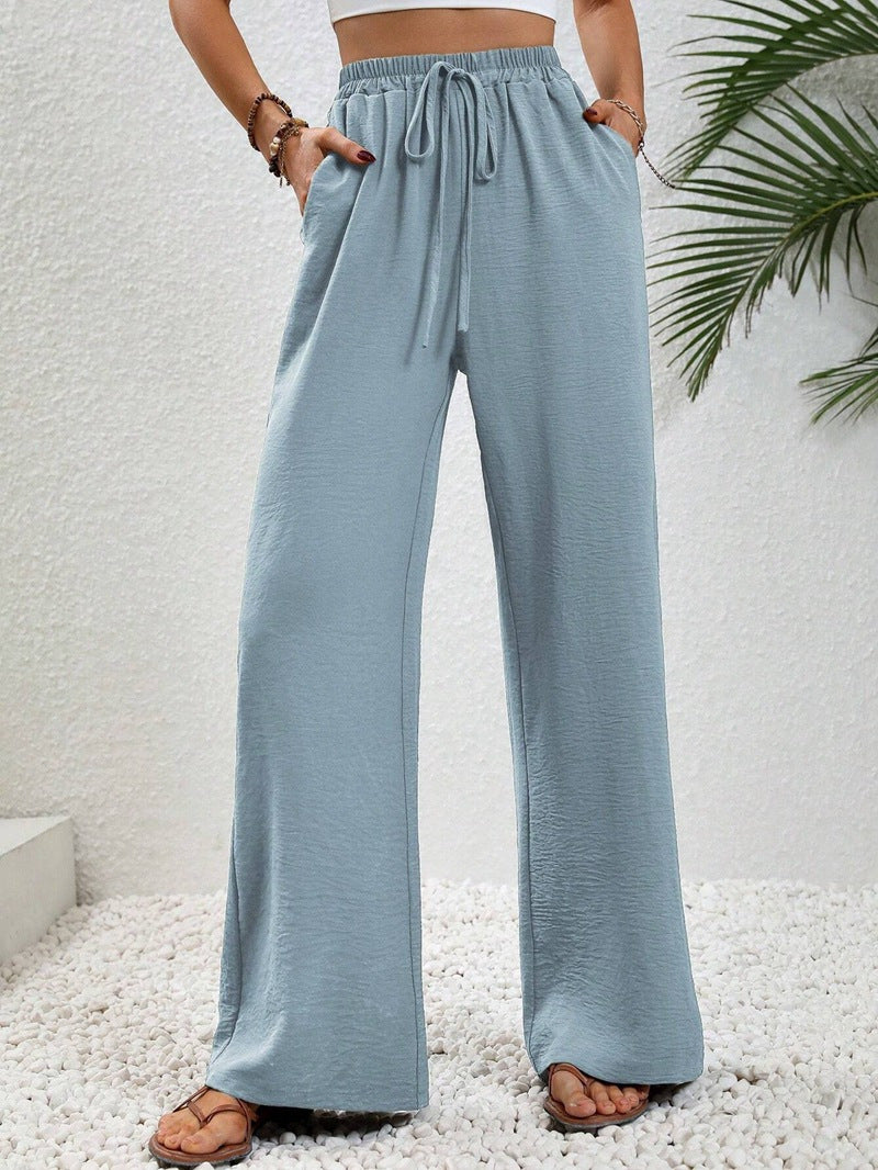Loose-fit leisure pants for women with an elastic waistband and practical side pockets Lune London