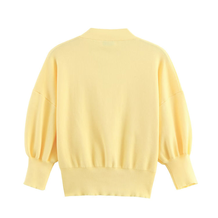 Women’s casual cardigan with puff sleeves and stylish button details Lune London