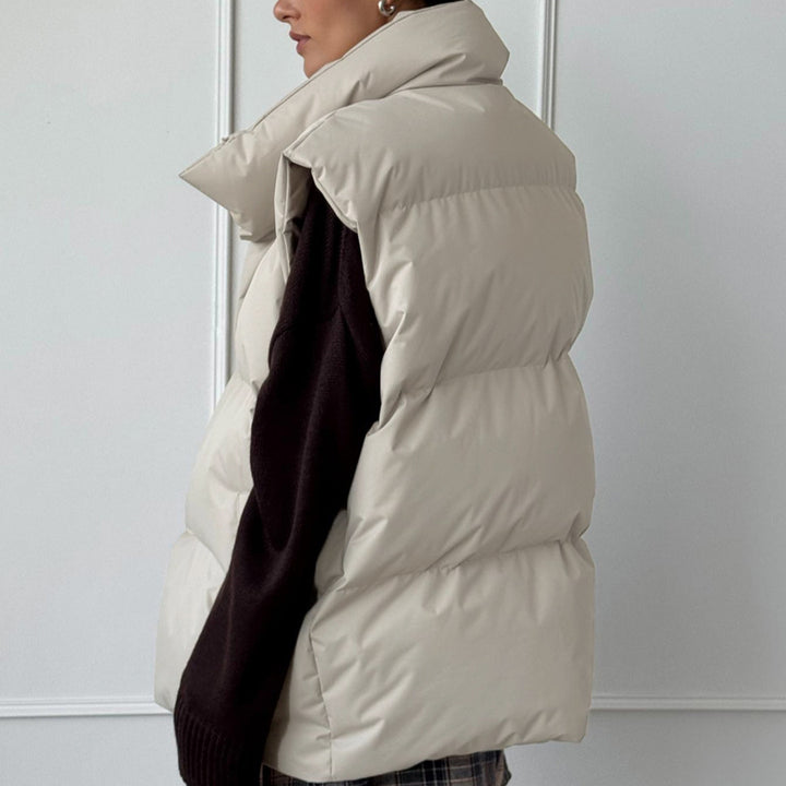 Ladies padded vest with high collar and practical side pockets Lune London