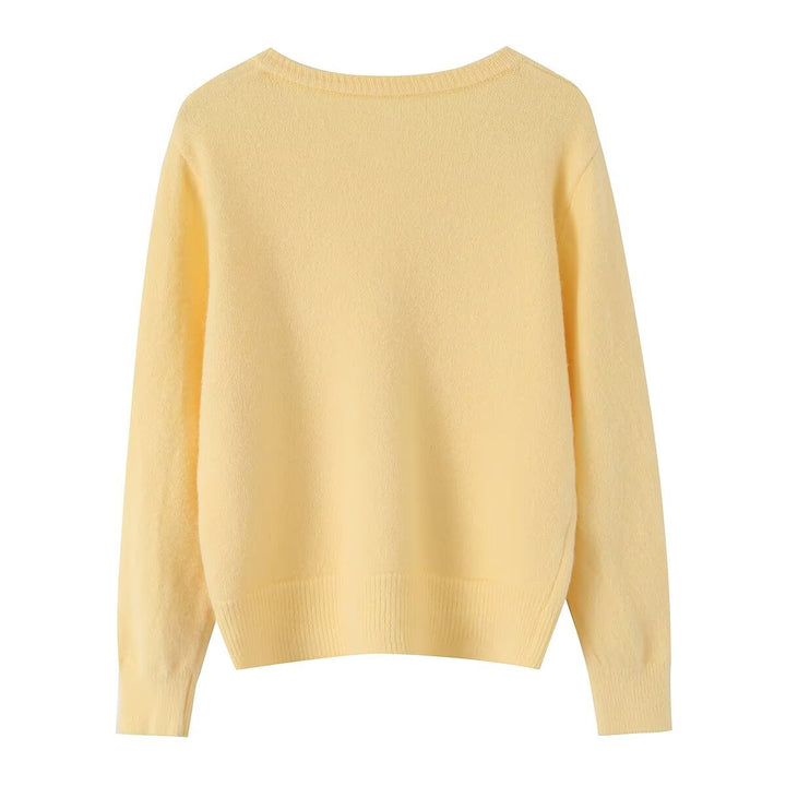 Women's lightweight fine knit cardigan with round neck, ribbed cuffs, and pearl buttons Amarae