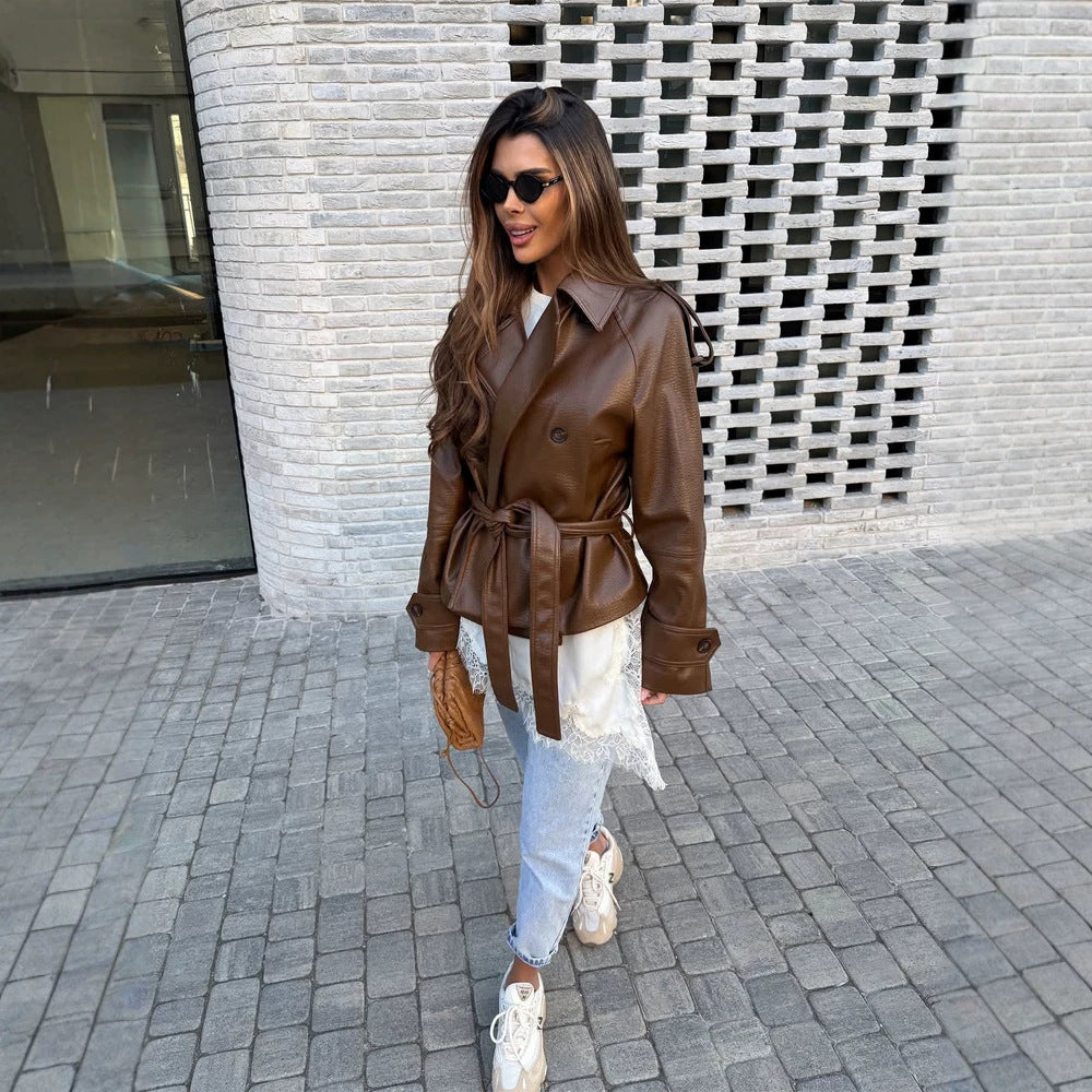Women’s short cut oversized faux leather trench coat with waist belt and epaulettes Amarae