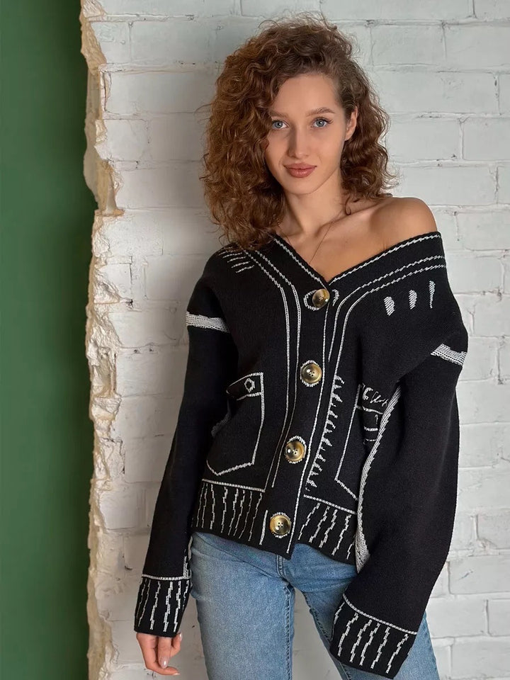Modern knitted jacket for women with asymmetrical design and decorative buttons Lune London