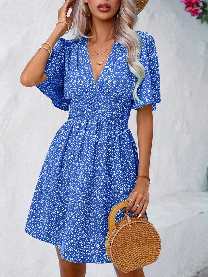 V-neck dress with snowflake pattern for women with puff sleeves and elastic belt Lune London