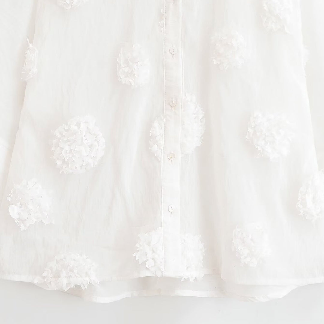 Women's blouse with three-quarter sleeves and three-dimensional flower appliqués Amarae
