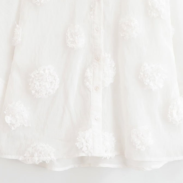 Women's blouse with three-quarter sleeves and three-dimensional flower appliqués Amarae