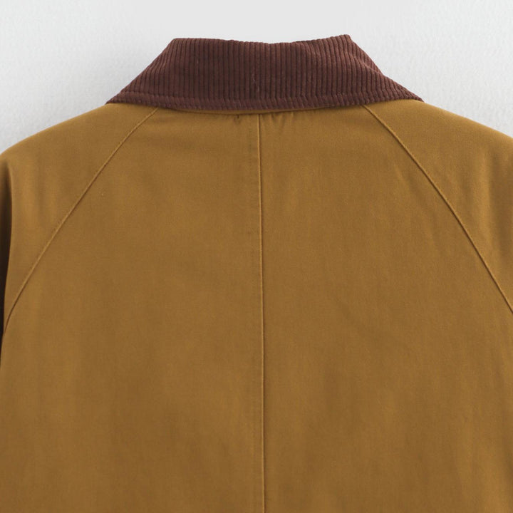 Women's transition jacket with practical button closure and large pockets Lune London