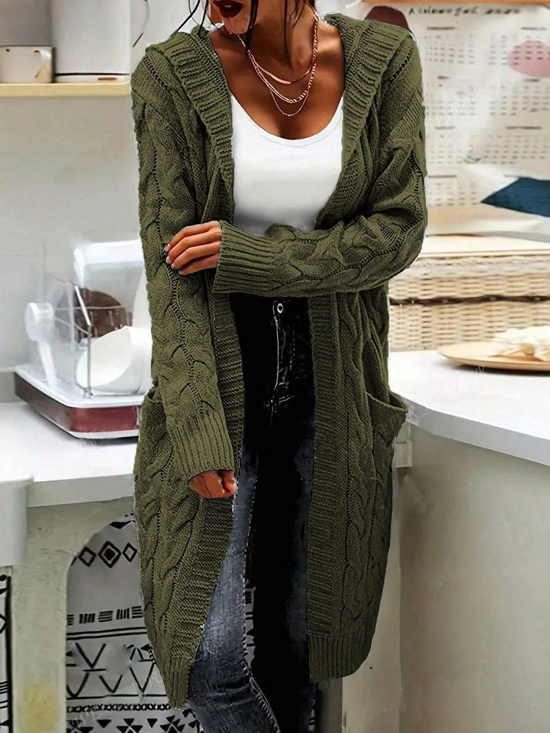 Chunky knit cardigan for women with practical pockets and elegant twisted details Lune London