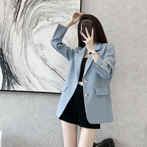 Blazer féminin chic avec tissu texturé et détails de bouton élégants Chic & Stil