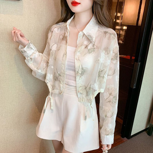 Blouse transparente pour femmes avec design floral Chic & Stil