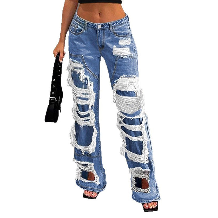 Women heavily distressed flared jeans with wide legs and ripped inserts Amarae