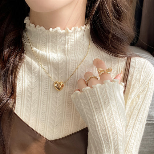 Pull femme à col roulé avec ourlet en vagues décoratif en tricot fin Chic & Stil