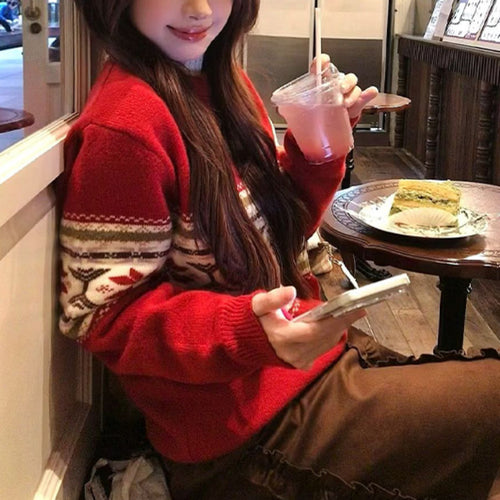 Sweater en tricot confortable pour femmes avec un mélange de motifs festifs Chic & Stil