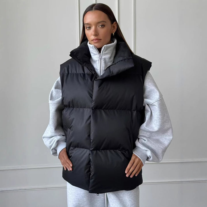 Ladies padded vest with high collar and pockets Amarae