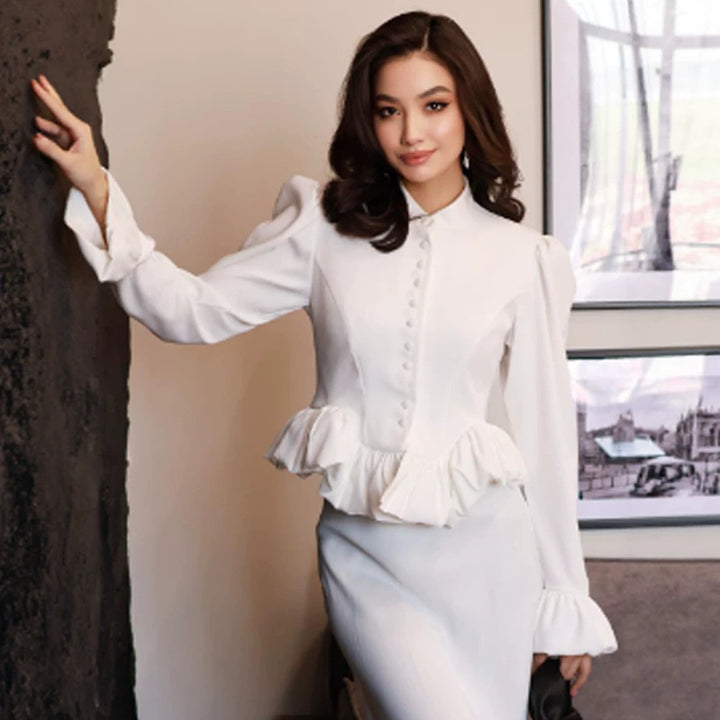 Ladies tailored peplum blouse with stand-up collar, covered button placket and puff sleeves Amarae