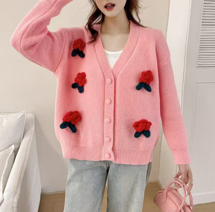 Women’s playful knitted cardigan with floral appliqués and Moon London button details