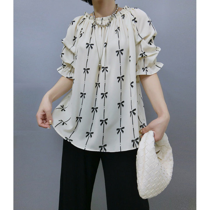 Blouse for women with ruffled sleeves and bow pattern Lune London