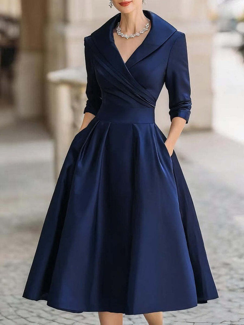 Robe portefeuille élégante pour femmes avec peplum et poches pratiques Chic & Stil