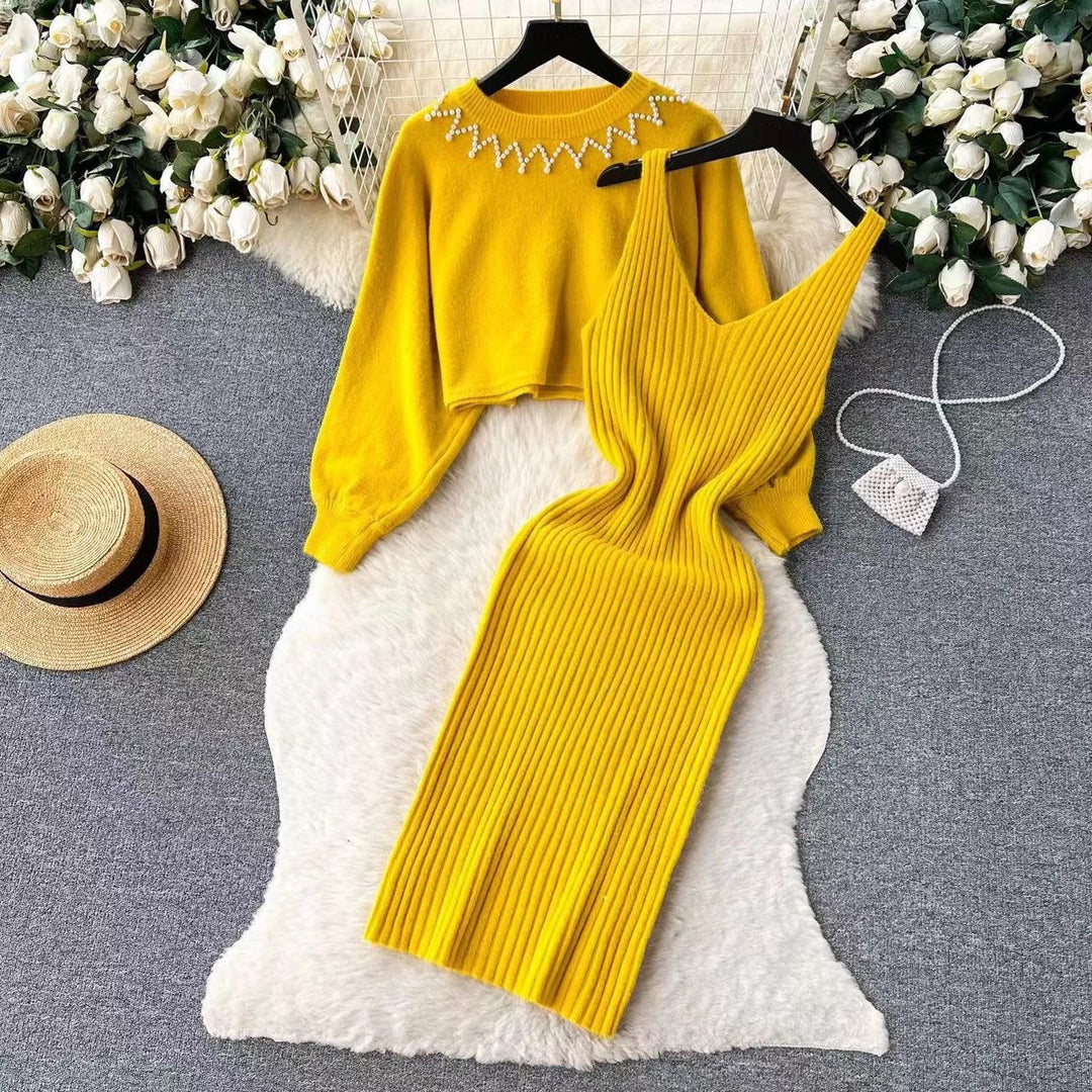 Women’s knitted dress with V-neckline and luxurious details Lune London