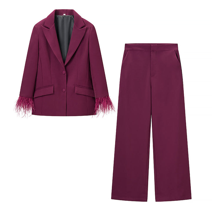 Ladies tailored tuxedo pant suit with feather embellishments at the cuffs Amarae