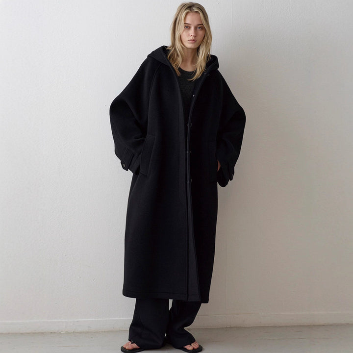 Manteau surdimensionné élégant pour femmes avec capuche et poches pratiques Chic & Stil