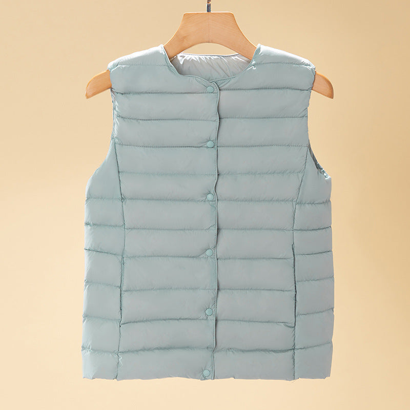Women's sleeveless quilted thermal vest with round neck and snap button placket Amarae