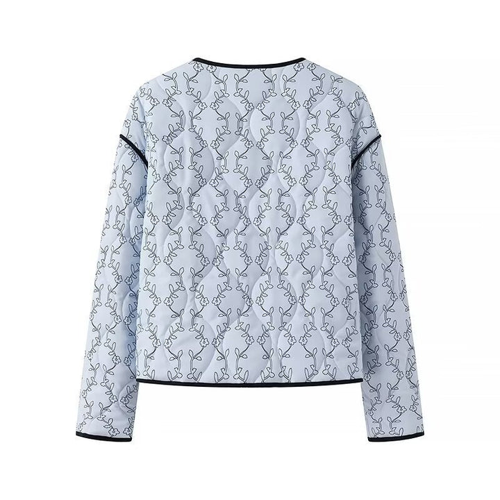 Women's lightweight quilted blouse jacket with V-neck, contrast piping and floral line print Amarae