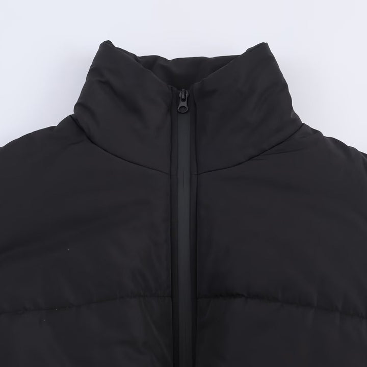 Ladies quilted transitional jacket with high collar and decorative zipper Lune London