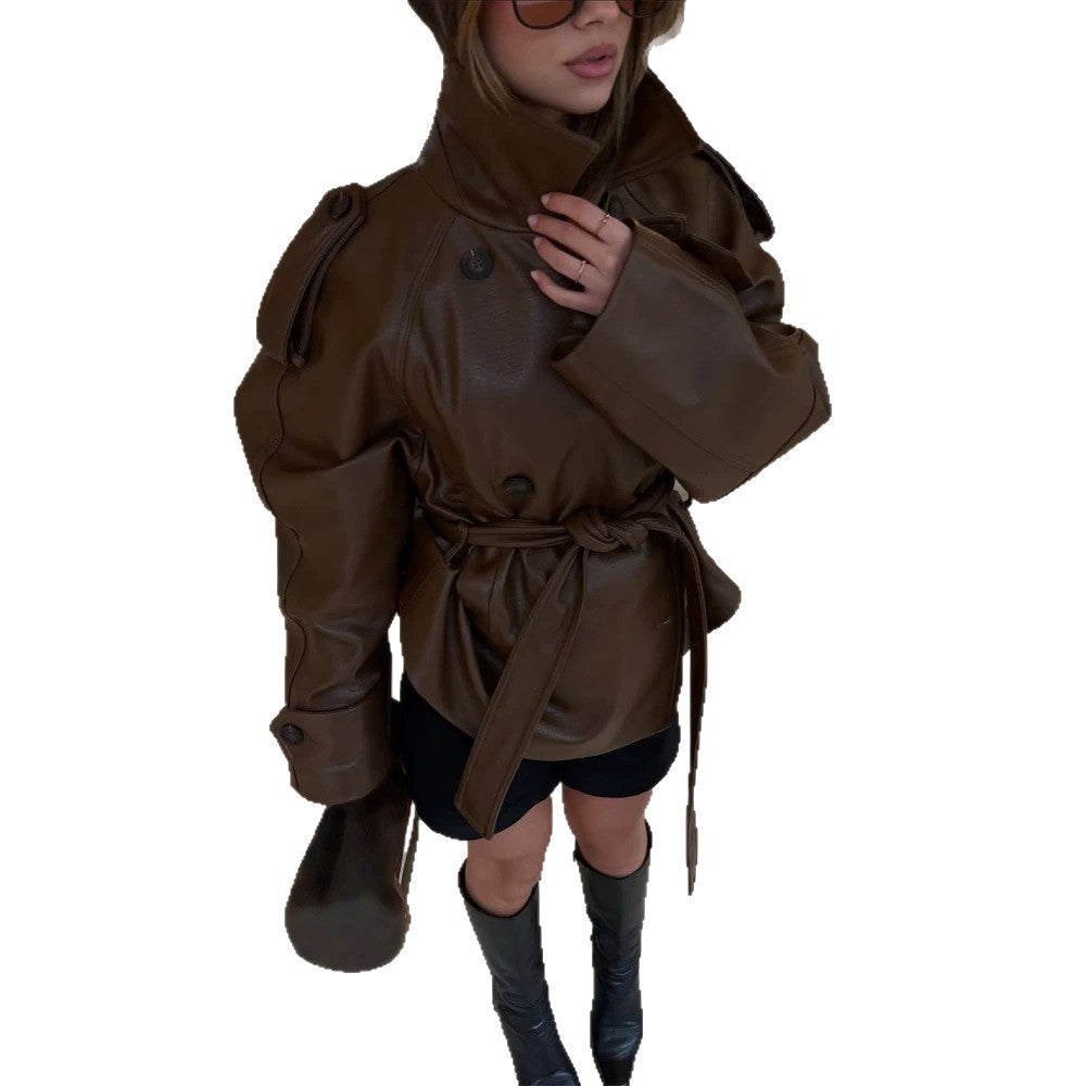 Women’s short cut oversized faux leather trench coat with waist belt and epaulettes Amarae