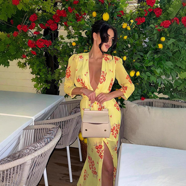 Women's maxi dress with deep V-neckline, tailored corset and high leg slit Amarae