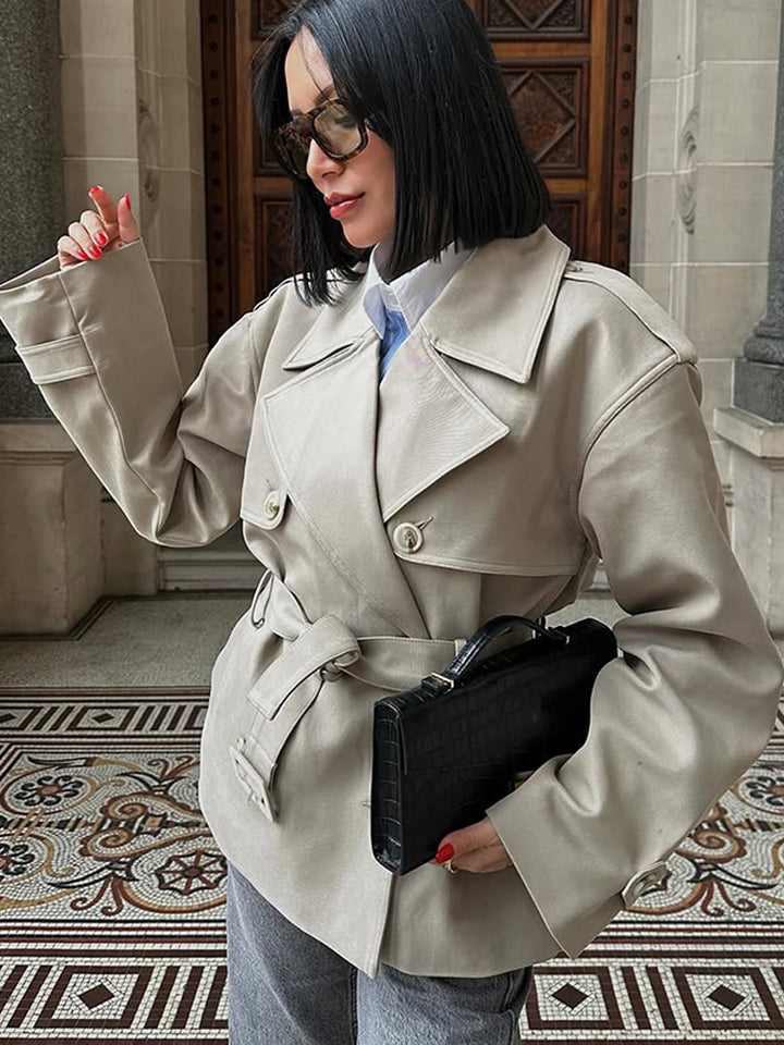 Women's short trench-style jacket with a tailored tie belt and wide sleeves Amarae
