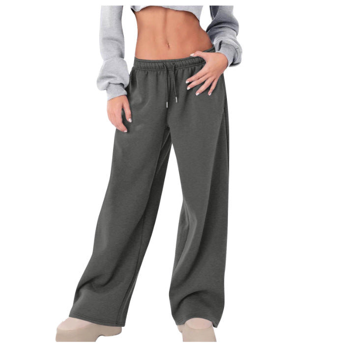 Women's loose casual pants with elastic waistband and side pockets Chic & Stil