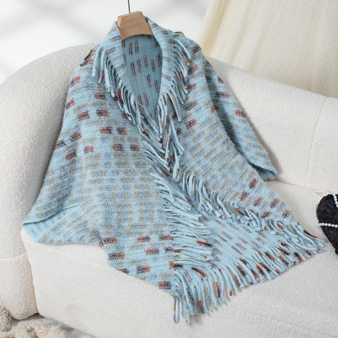 Ladies elegant poncho with fringed details and a modern plaid pattern Lune London