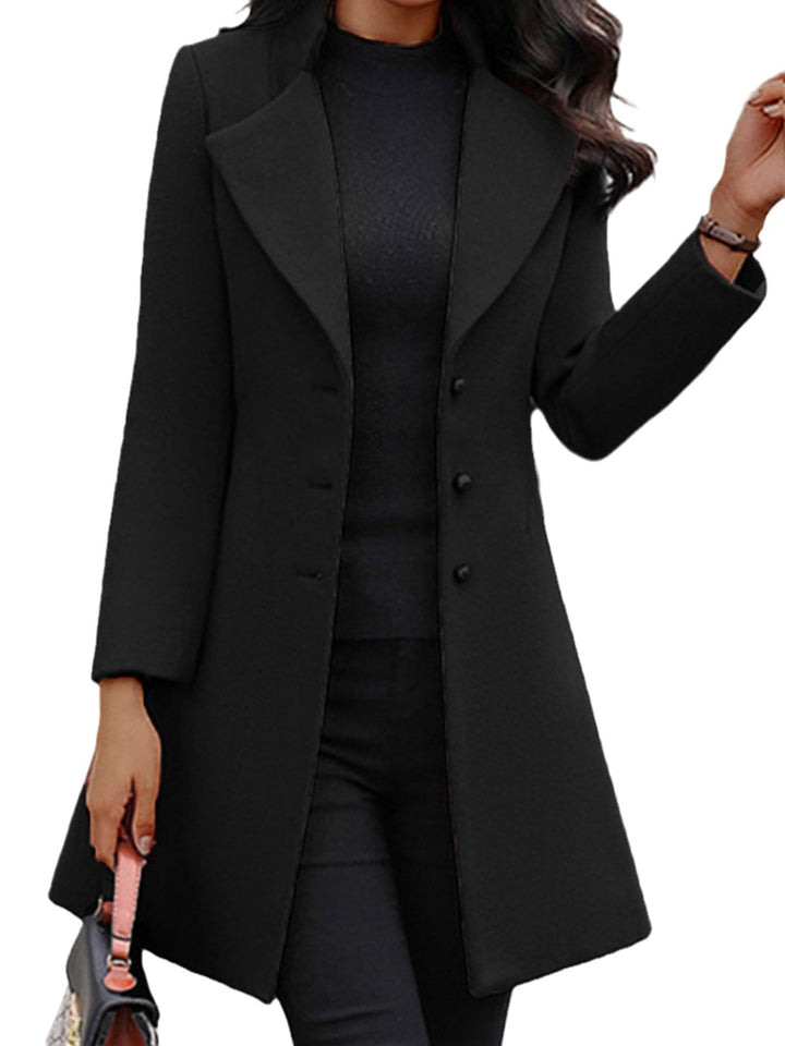 Elegant trench coat for women with a wide lapel and a chic button design.