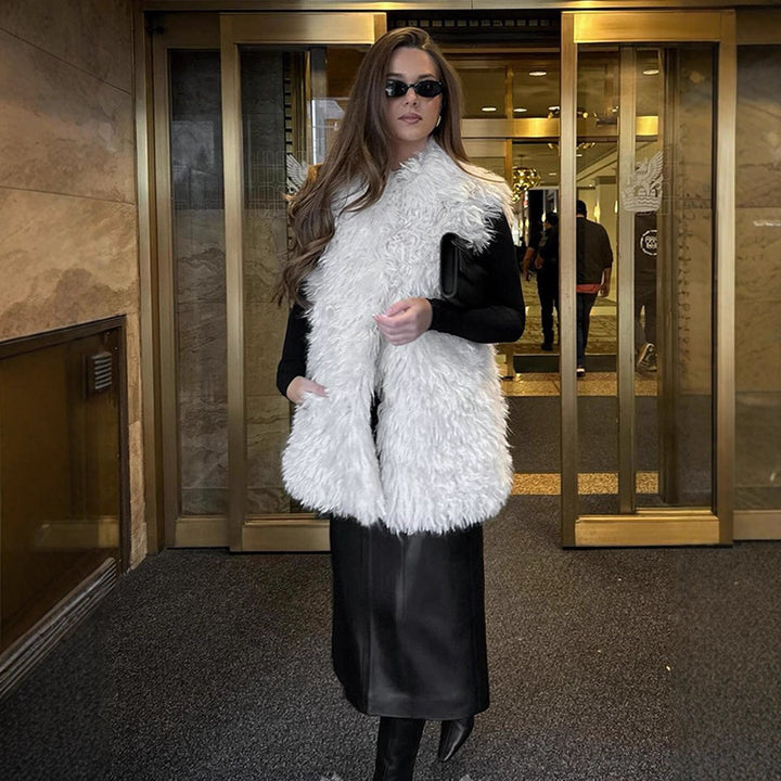 Women's Longer Cozy Faux Fur Vest with Shaggy Look and Front Pockets Amarae