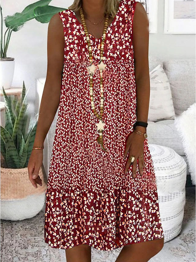 Airy summer dress for women with a playful floral pattern and a fluid silhouette Lune London