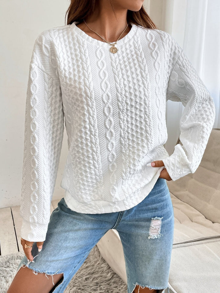 Knitted sweater for women with structured surface texture and elegant round neckline Lune London
