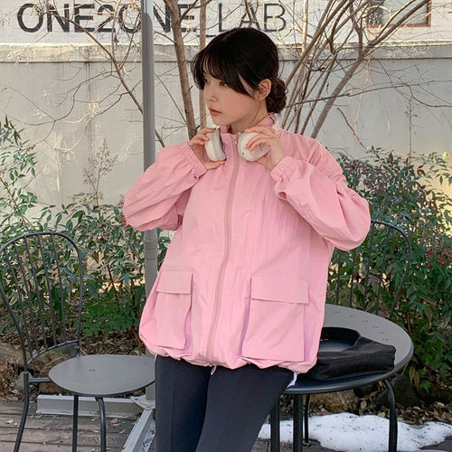 Women's transitional jacket with voluminous sleeves and practical pockets Chic & Stil