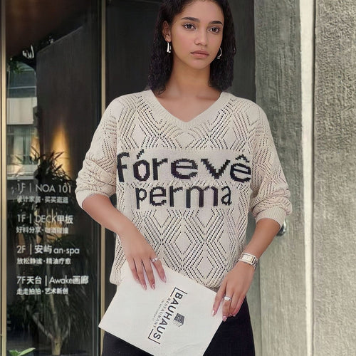 Trendy knitted sweater for women with a creative honeycomb pattern and a textured detail Amarae