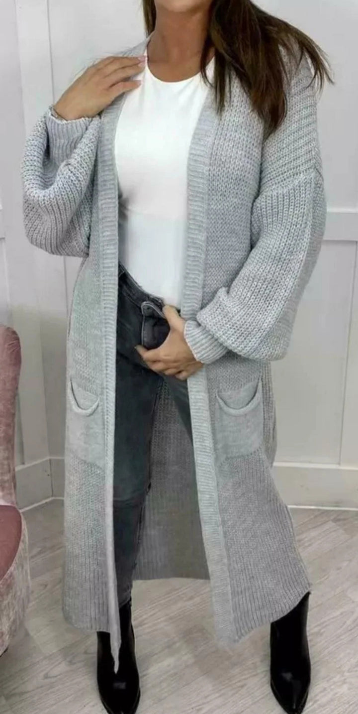 Ladies' knitted coat with deep pockets and modern details Lune London