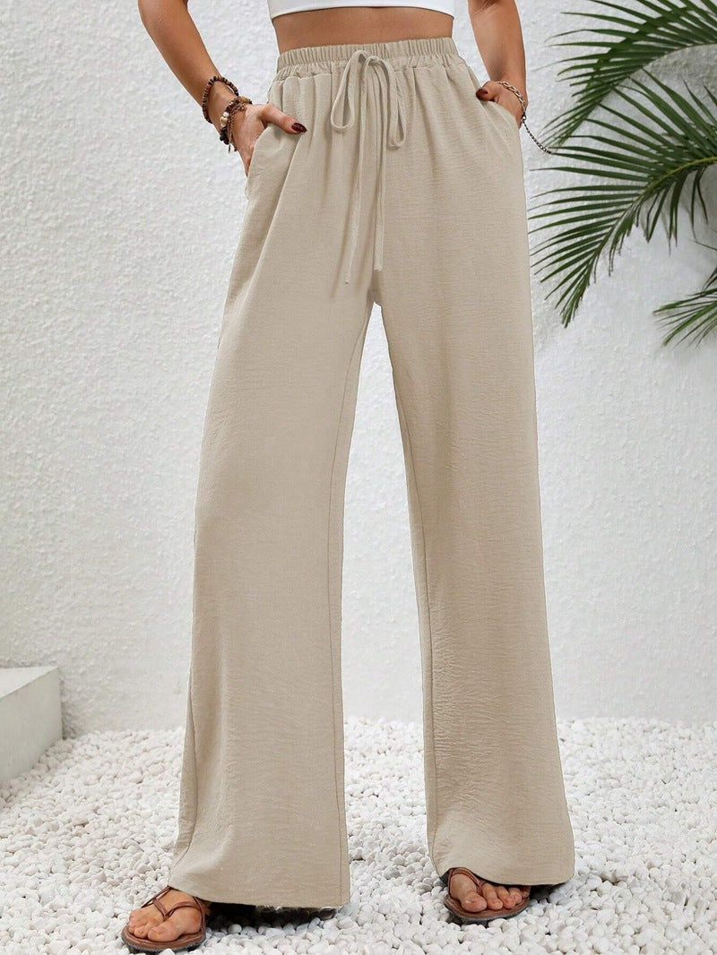 Loose-fit leisure pants for women with an elastic waistband and practical side pockets Lune London
