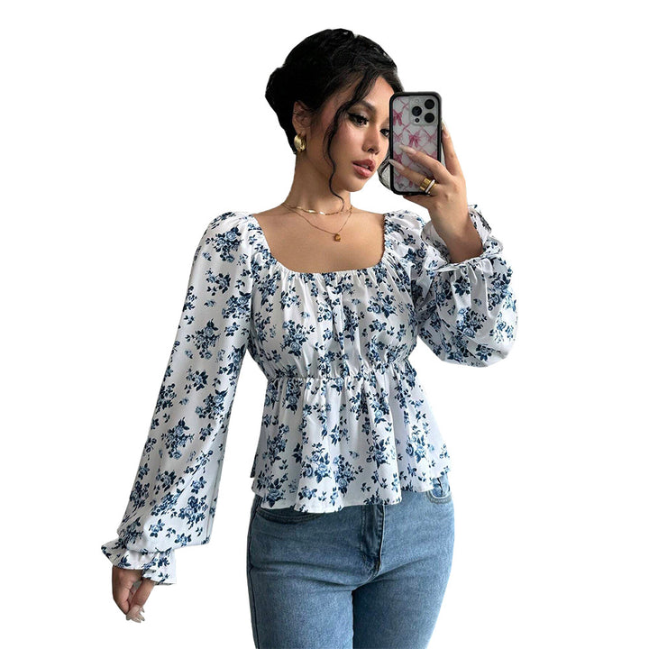 Blouse femme avec design floral et manches volumineuses Chic & Stil