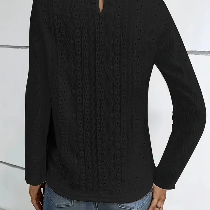 Elegant blouse for women with lace inserts and a detailed hole pattern Lune London