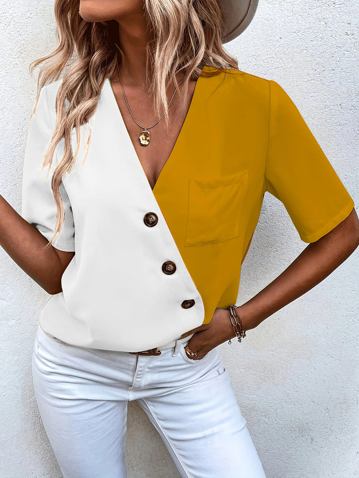 Lune London feminine design blouse with asymmetrical cut and elegant button closure
