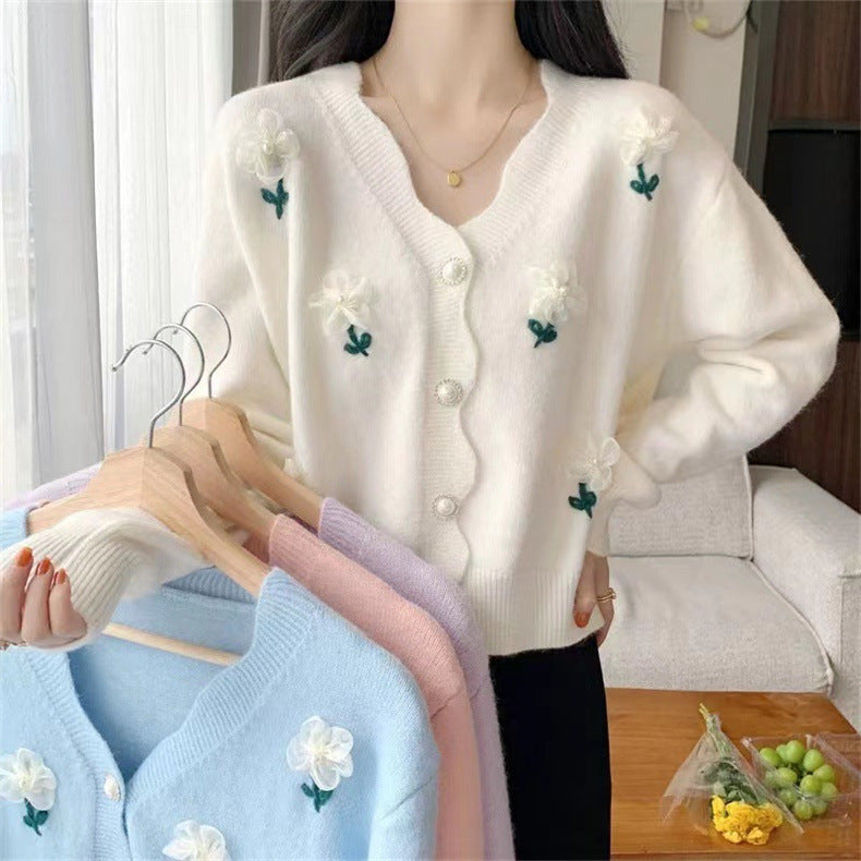Sweater jacket for women with a floral design and elegant pearl buttons Lune London