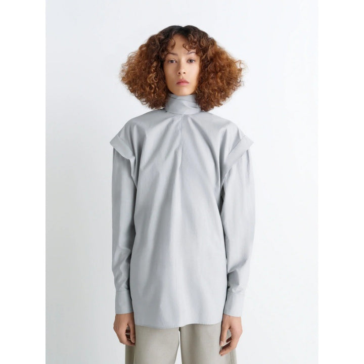 Elegant long sleeve top for women with high collar and modern ruffled sleeves Lune London